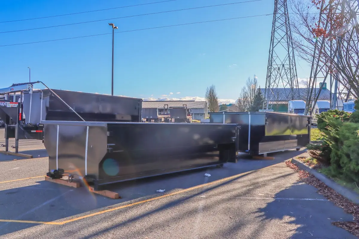 Roll-off dumpster ready for waste disposal at job site for Yard Waste Dumpster Rental in Mason